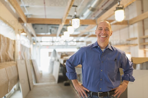 Portrait of smiling business owner.