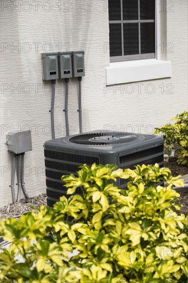 Air conditioning unit in garden.