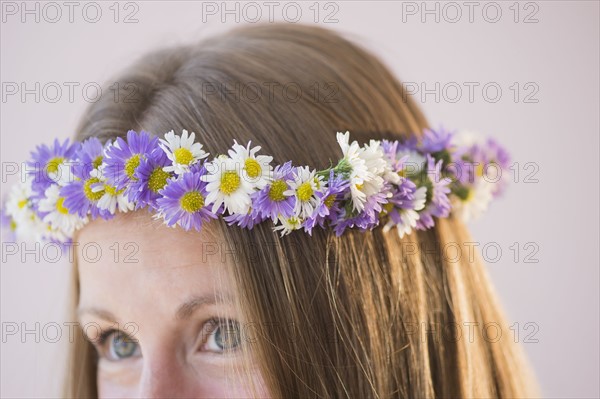 Studio shot of woman in wreath