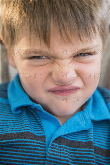 Portrait of frustrated boy (6-7)