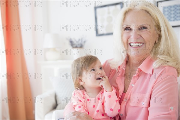 Portrait of granmother with granddaughter ( 2-3 )