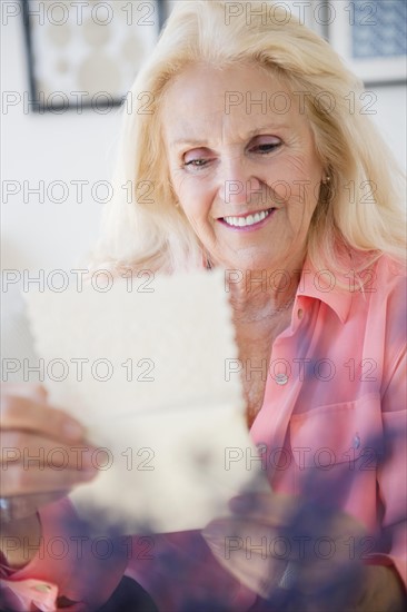 Senior woman reading letter
