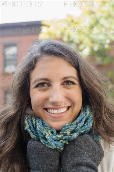 Portrait of young woman in autumn