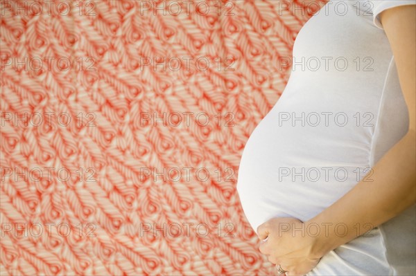 Side-view of pregnant woman