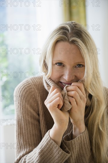 Portrait of woman wearing sweater