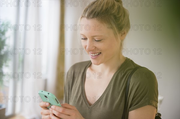 Woman texting on mobile phone