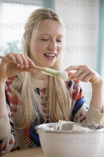 Portrait of woman baking cake