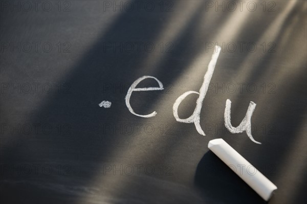 Chalk letter on blackboard