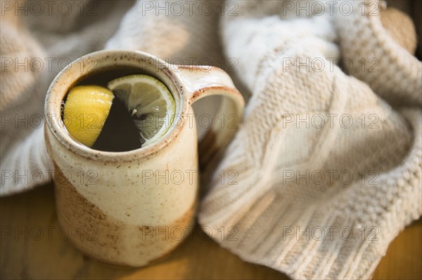 Hot tea with lemon slices