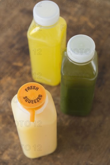 Three bottles with fresh juice