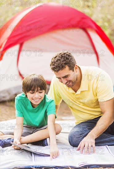 Father and son (12-13) camping