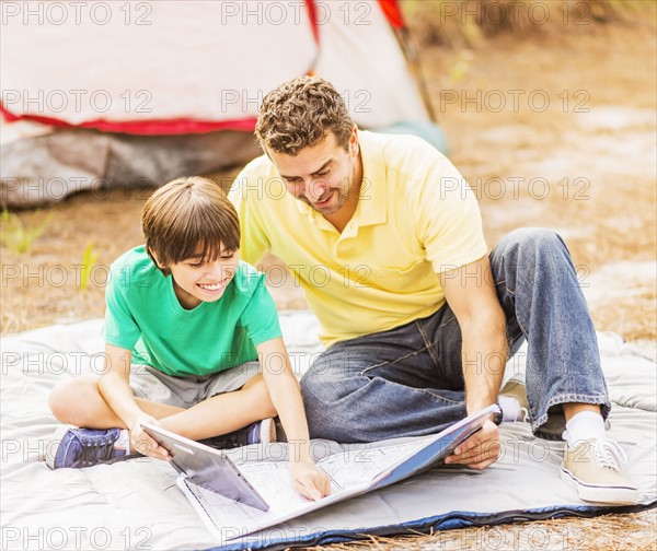 Father and son (12-13) camping