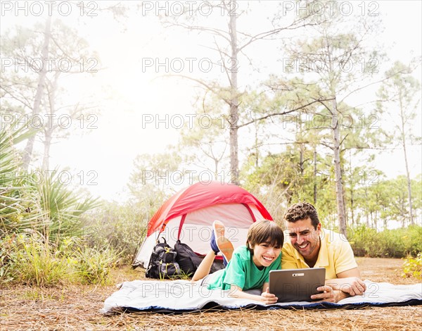 Father and son (12-13) camping
