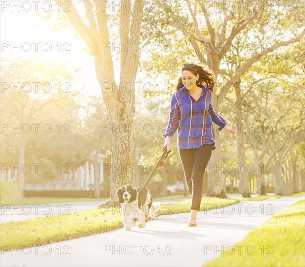 Woman running with her dog