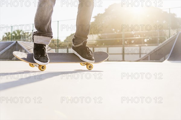 Man skateboarding in skatepark