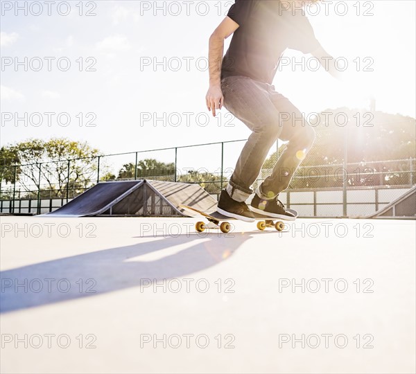 Man skateboarding in skatepark