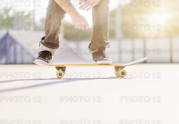 Man skateboarding in skatepark