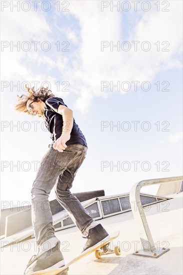 Man skateboarding in skatepark