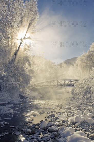 Scenic view of stream in winter