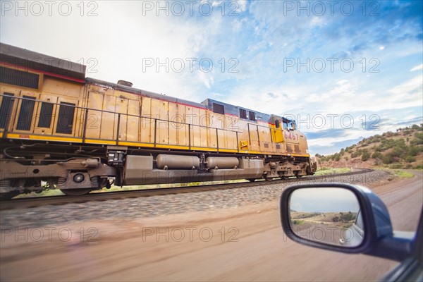 Train on railroad tracks in countryside