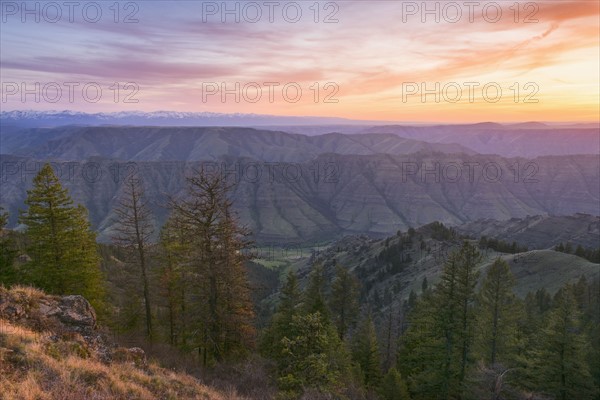 Scenic view of landscape at sunset