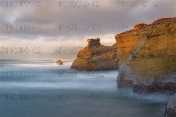 Scenic view of cliffs along coastline