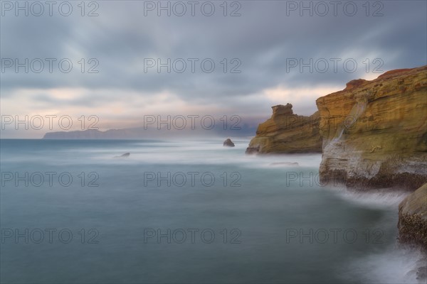 Scenic view of cliffs along coastline