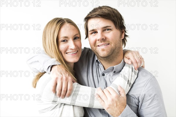 Mid-adult couple embracing