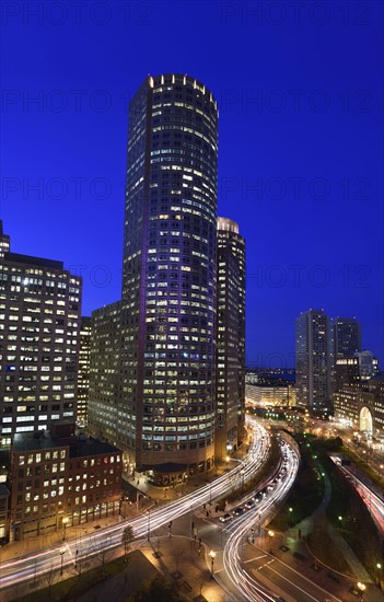 High angle view of illuminated cityscape at dusk