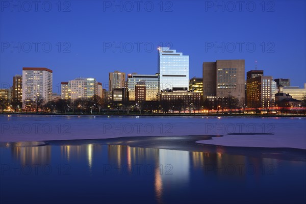 Waterfront at dusk, reflection in water