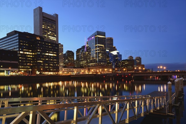 Illuminated waterfront at dusk