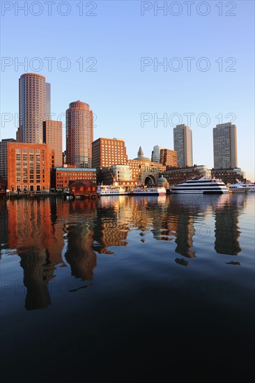 Symmetrical view of architecture reflecting in water