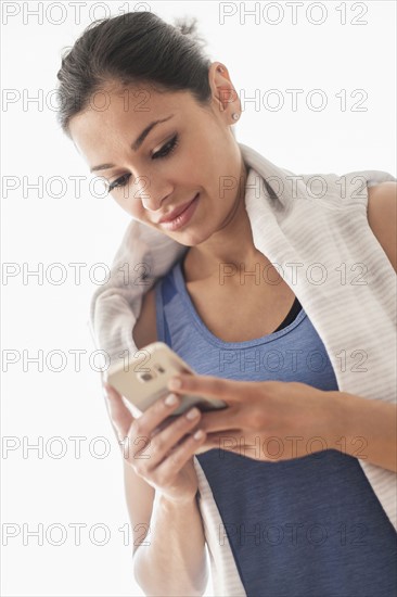 Young woman using smart phone.