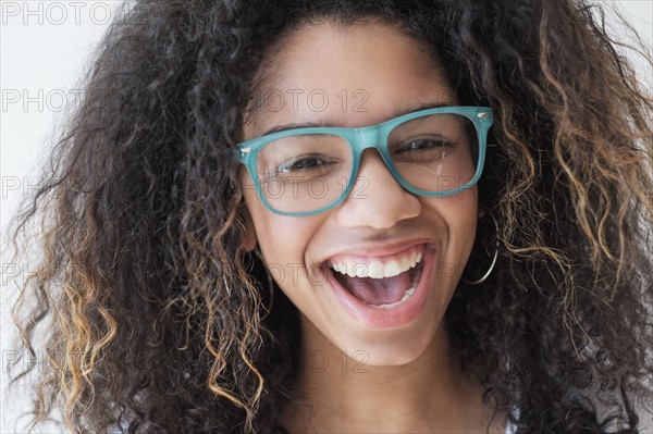 Portrait of teenage girl (16-17) wearing eyeglasses.