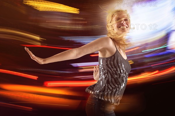 Woman dancing in club.
