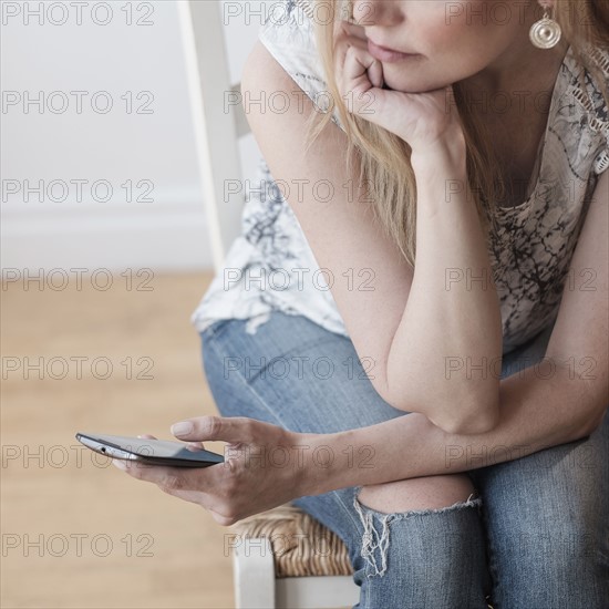 Woman using smart phone.