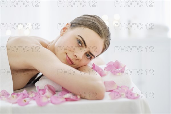 Portrait of young woman during beauty treatment.