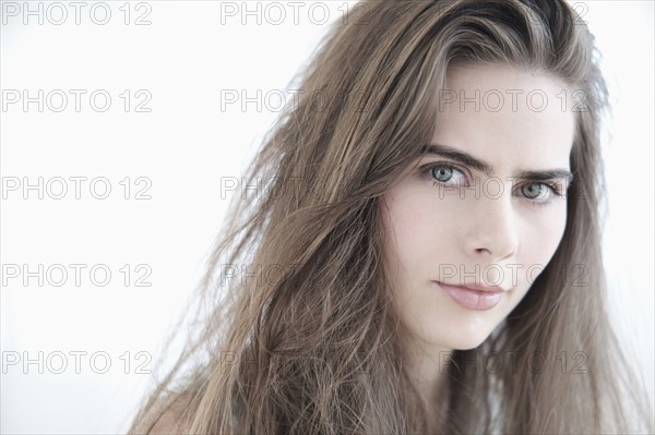 Portrait of young woman with blue eyes.