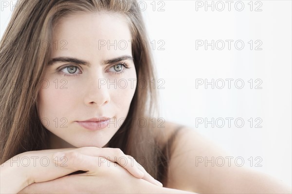Portrait of young woman with blue eyes.
