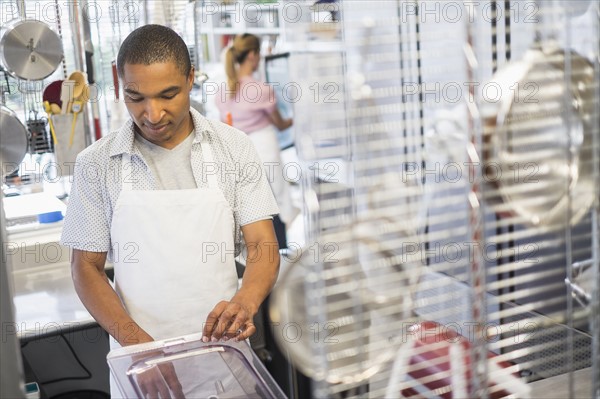 Bakery owner at work.