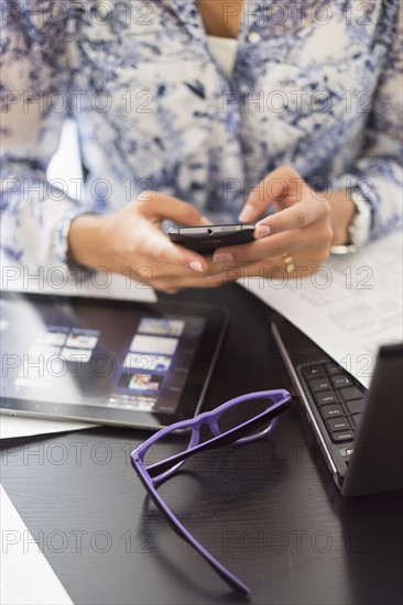 Young woman working in office.