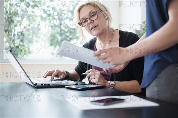 Women working in office.