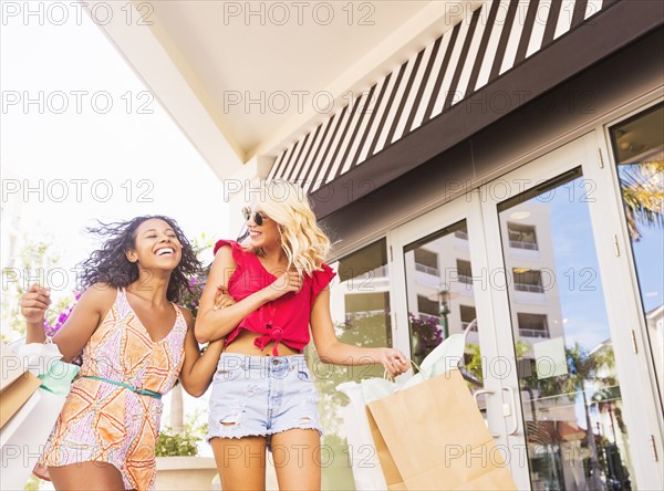 Female friends shopping