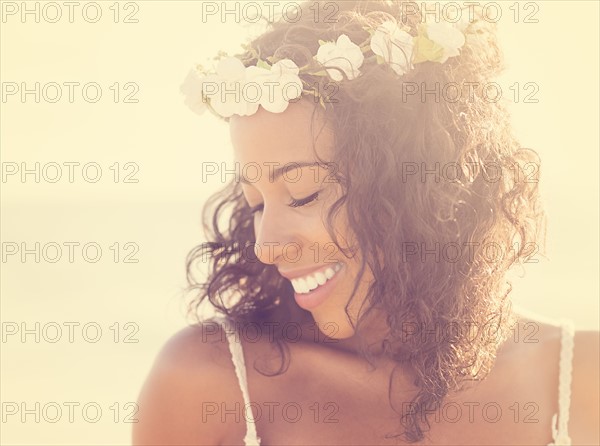 Young woman wearing wreath