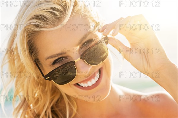 Young woman wearing sunglasses