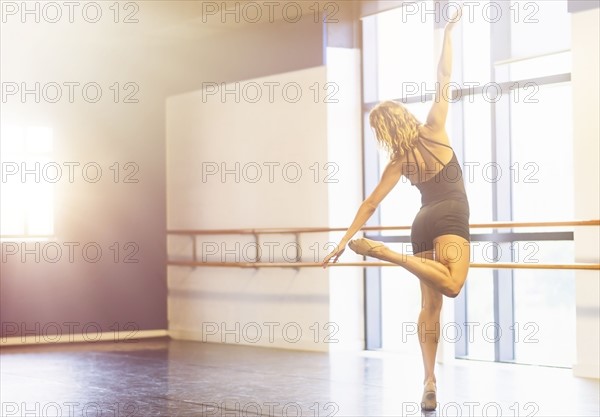 Young woman dancing in dance studio