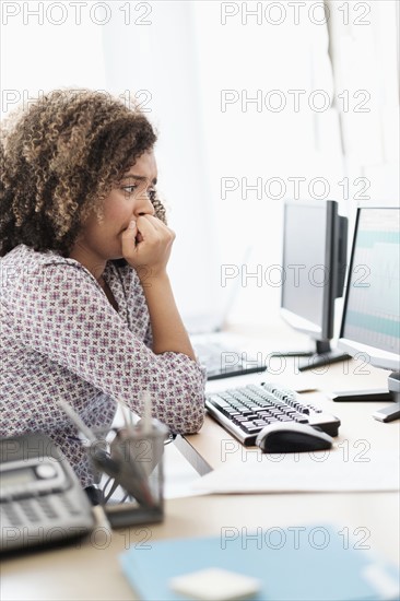 Young woman working at office.