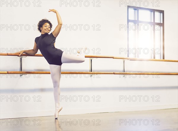 Young woman dancing in dance studio