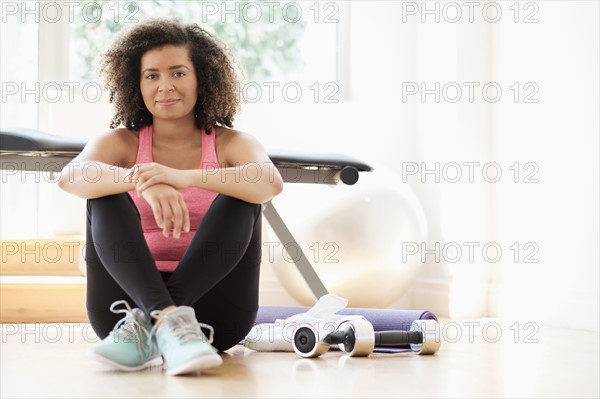 Portrait of young woman at gym.