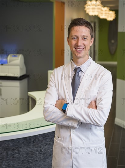 Portrait of smiling dentist